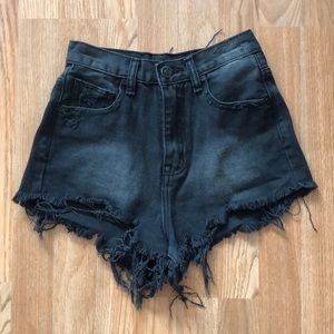 UNIF black Highwaisted distressed shorts